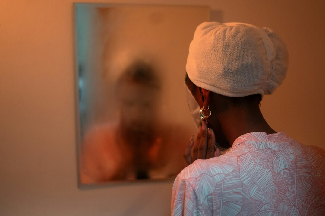 person practicing speech in mirror
