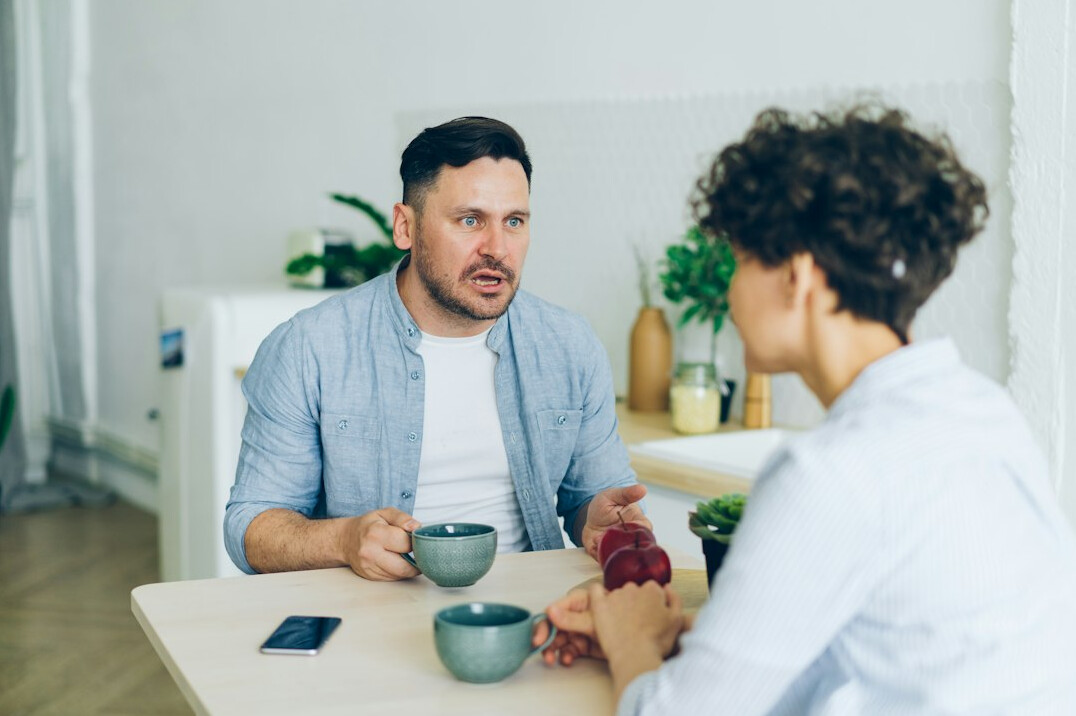 two people resolving conflict calmly