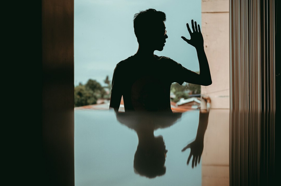 person reflecting alone